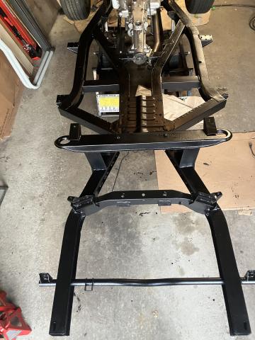 top view of repaired frame, freshly painted black