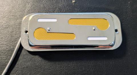 chrome soapbar-shaped pickup with gold foil inlays